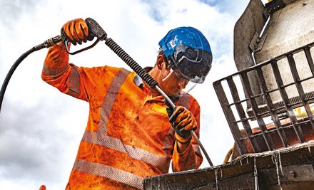 construction site worker using the safety helmet at work