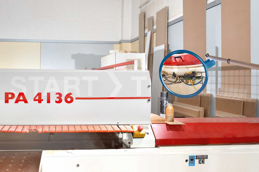 Vision inspection mirror in use in manufacturing facility